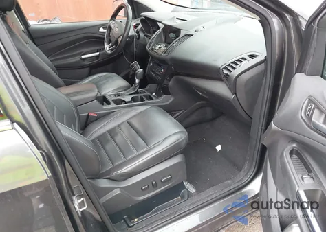 2017 Ford Escape Titanium z USA, uszkodzony, nr VIN 1FMCU0J93HUB62140